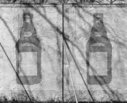 photomontage hoarding/ beer bottles