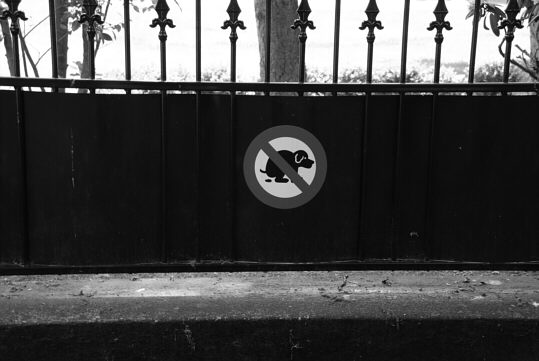 prohibition sign at a fence