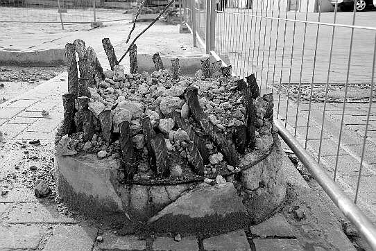 The base of a column of the demolished tenement building