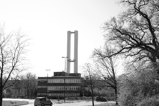 two very tall chimneys which are part of the paint factory of the automobile plant in Bremen